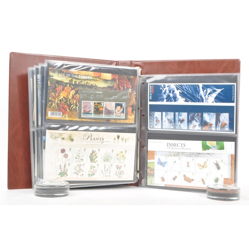 514 - Royal Mail - A large collection of British Royal Mail commemorative stamps presentation packs. The c... 