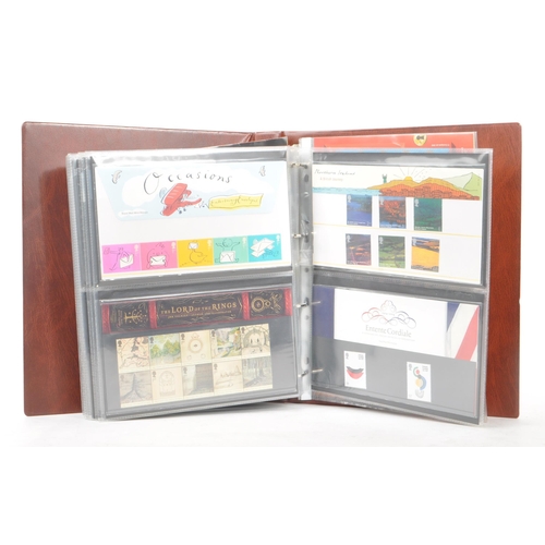 516 - Royal Mail - A large collection of British Royal Mail commemorative stamps presentation packs held w... 