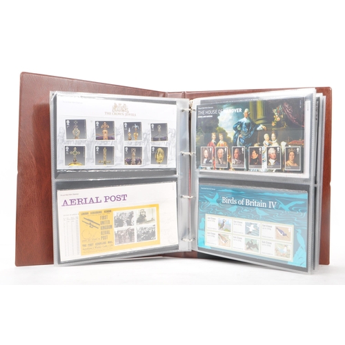 517 - Royal Mail - A large collection of British Royal Mail commemorative stamps presentation packs held w... 