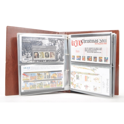 517 - Royal Mail - A large collection of British Royal Mail commemorative stamps presentation packs held w... 