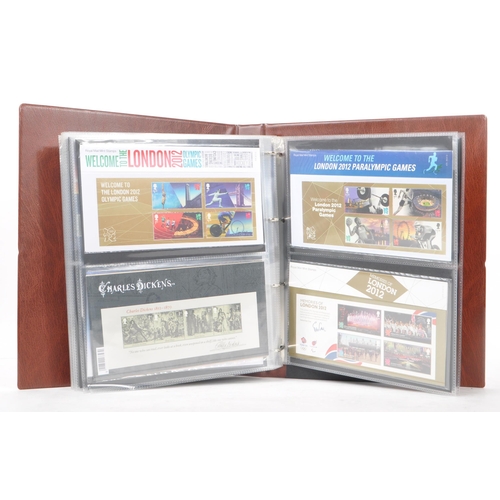 517 - Royal Mail - A large collection of British Royal Mail commemorative stamps presentation packs held w... 