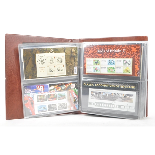517 - Royal Mail - A large collection of British Royal Mail commemorative stamps presentation packs held w... 