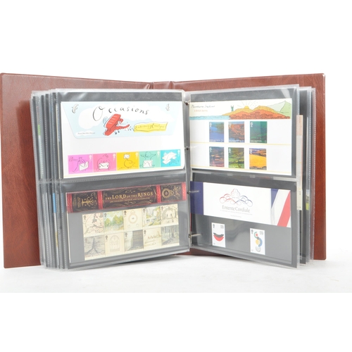 519 - Royal Mail - A large collection of British Royal Mail commemorative stamps presentation packs. The c... 