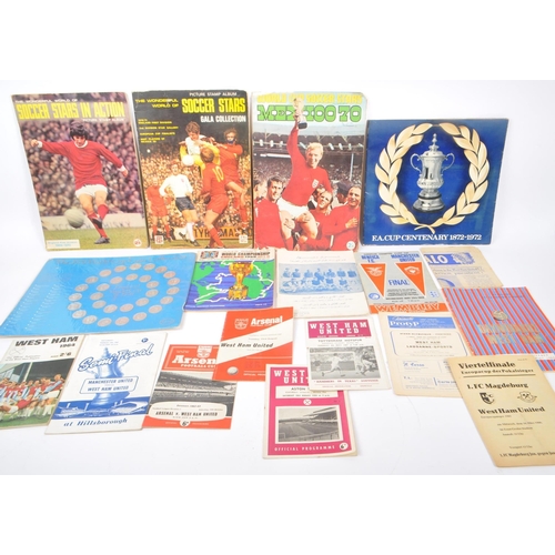 530 - Of Sporting Interest - A collection of vintage 20th century football memorabilia. Including football... 