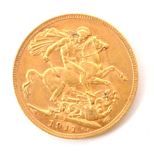 542 - A 1911 George V 22ct full gold sovereign featuring bust of King George V to obverse and St George wi... 