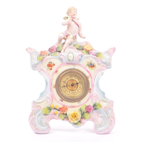 55 - An early 20th Century continental Meissen / Dresden style porcelain mantel clock having pastel pink ... 