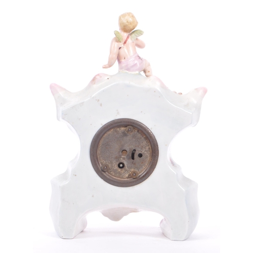 55 - An early 20th Century continental Meissen / Dresden style porcelain mantel clock having pastel pink ... 