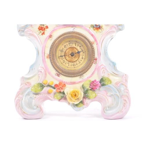 55 - An early 20th Century continental Meissen / Dresden style porcelain mantel clock having pastel pink ... 