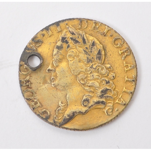 550 - A mid 18th century 1748 George II half guinea gold coin. The coin having George II intermediate bust... 