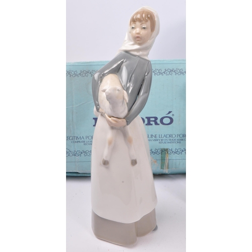 56 - Lladro / Nao - A collection of 20th century Lladro and Nao porcelain statues and figures. The collec... 