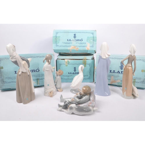 56 - Lladro / Nao - A collection of 20th century Lladro and Nao porcelain statues and figures. The collec... 