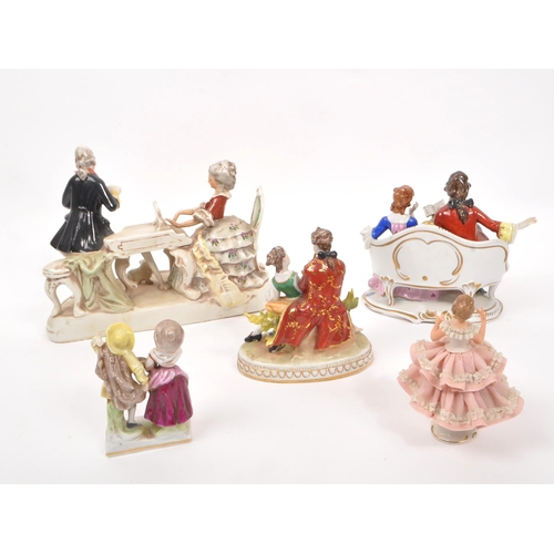 58 - A collection of 20th Century continental possibly German china porcelain figurines to include a larg... 