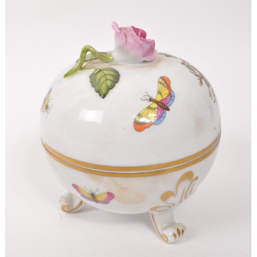 59 - Herend Hungary - A 20th Century china porcelain lidded pot raised upon three scroll detailed legs ha... 