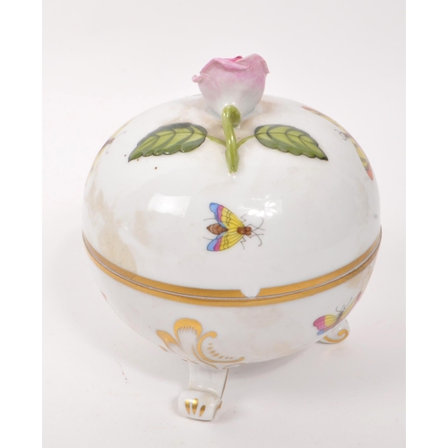 59 - Herend Hungary - A 20th Century china porcelain lidded pot raised upon three scroll detailed legs ha... 