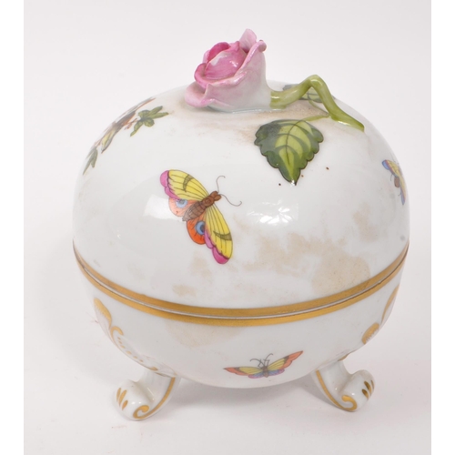 59 - Herend Hungary - A 20th Century china porcelain lidded pot raised upon three scroll detailed legs ha... 