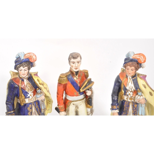 61 - A collection of three 20th Century continental believed French porcelain figurines to include two fi... 