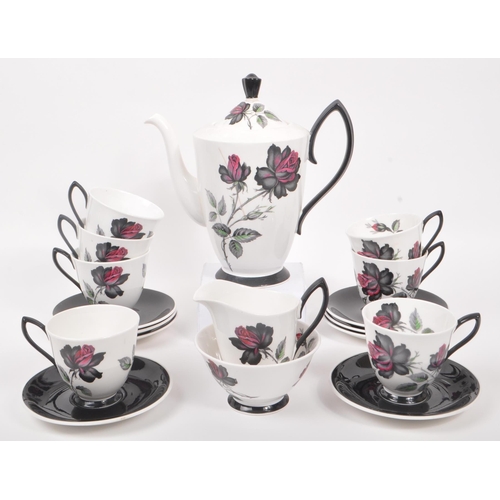 66 - Royal Albert - A 20th Century vintage bone china tea / coffee service in the black rose pattern havi... 