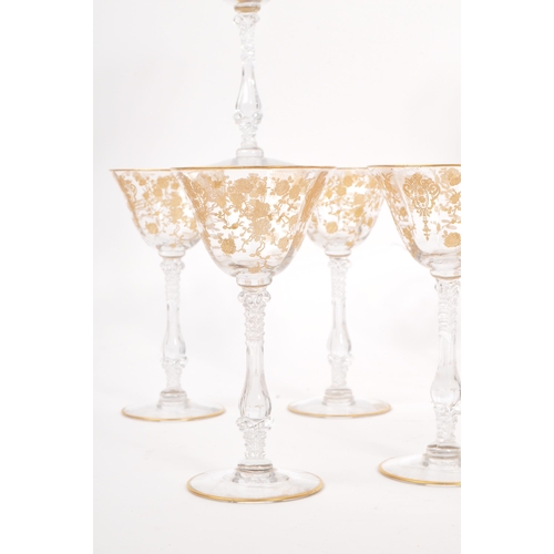 70 - A collection of 20th Century drinking glasses comprising of five ornate gilt foliate liquor glasses ... 