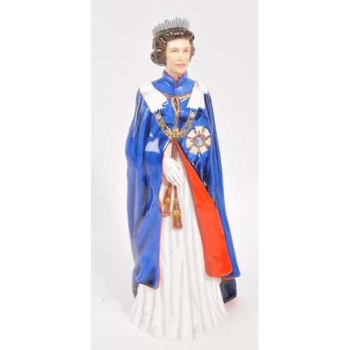 79 - Royal Doulton - A 20th Century china limited edition Royal Doulton figurine in the form of Her Majes... 