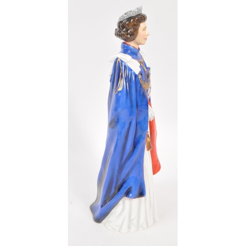 79 - Royal Doulton - A 20th Century china limited edition Royal Doulton figurine in the form of Her Majes... 