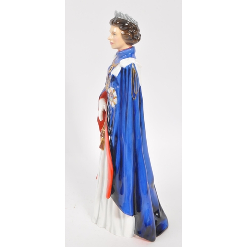 79 - Royal Doulton - A 20th Century china limited edition Royal Doulton figurine in the form of Her Majes... 