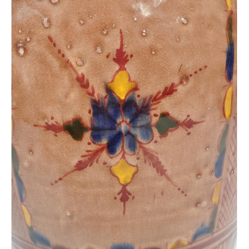 83 - A 20th century Moroccan Safi manner studio pottery terracotta vase. The vase having rounded body, ta... 