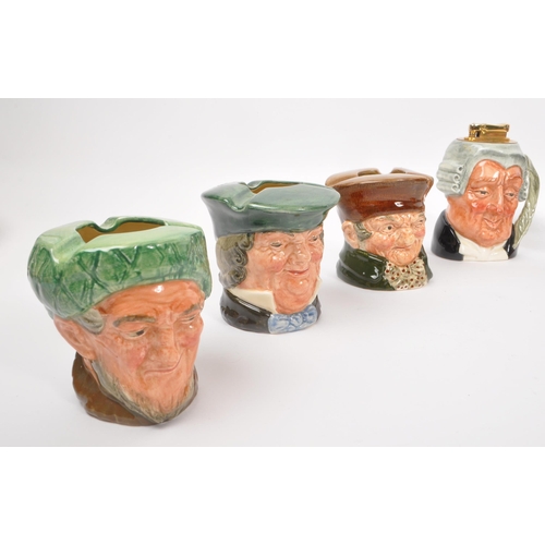 95 - Royal Doulton - A collection of 20th Century ceramic Royal Doulton character ashtrays and lighters c... 