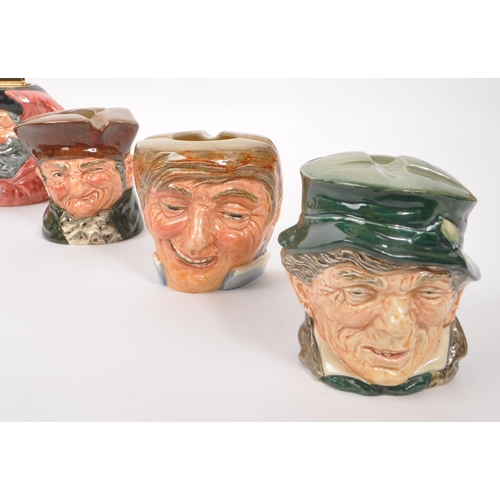 95 - Royal Doulton - A collection of 20th Century ceramic Royal Doulton character ashtrays and lighters c... 