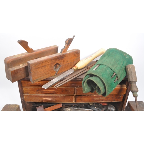 333 - A collection of vintage 20th century carpentry wood working tools. To include wood planes, hand scre... 