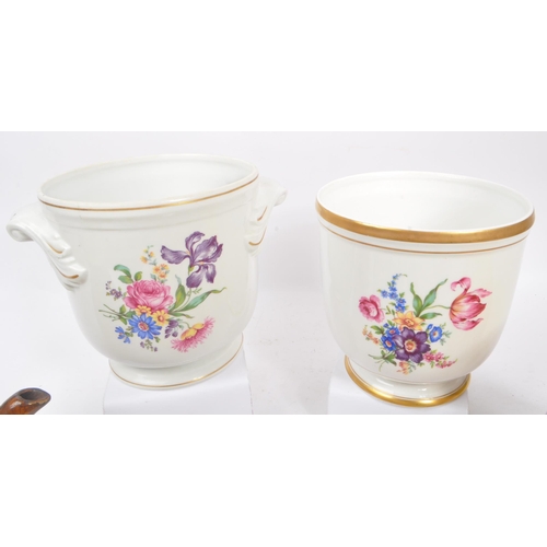 179 - A collection of foreign studio ceramic pottery. A pair of Portuguese ceramic planters with floral de... 