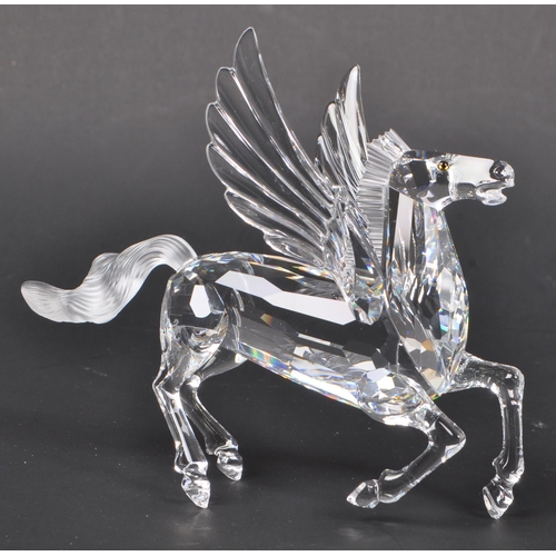 199 - Swarovski - A crystal glass Swarovski figurine / ornament in the form of a Pegasus 216327 having win... 