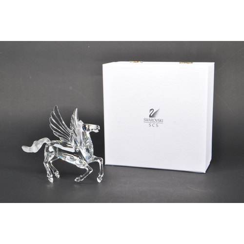 199 - Swarovski - A crystal glass Swarovski figurine / ornament in the form of a Pegasus 216327 having win... 