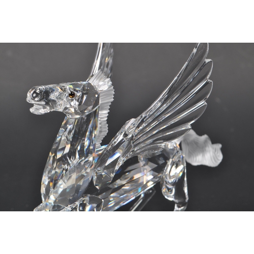 199 - Swarovski - A crystal glass Swarovski figurine / ornament in the form of a Pegasus 216327 having win... 