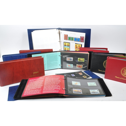 533 - A collection of 20th Century unfranked presentation pack stamps from Jersey and Guernsey presented w... 