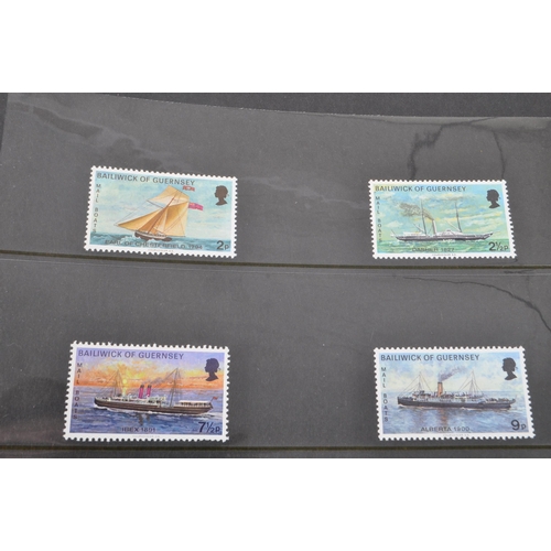 533 - A collection of 20th Century unfranked presentation pack stamps from Jersey and Guernsey presented w... 