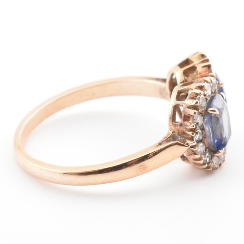 1 - A rose gold, sapphire and diamond double cluster ring. The vintage ring having two four claw set ova... 