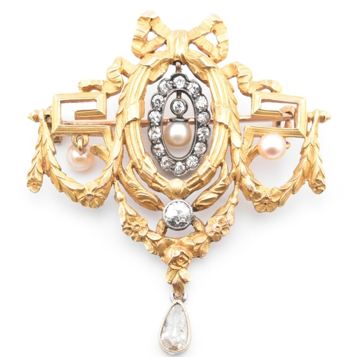 100 - An early 20th century Louis XVI style 18ct gold pearl and diamond brooch pin. The brooch pin in the ... 