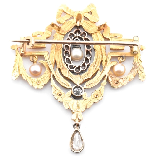 100 - An early 20th century Louis XVI style 18ct gold pearl and diamond brooch pin. The brooch pin in the ... 