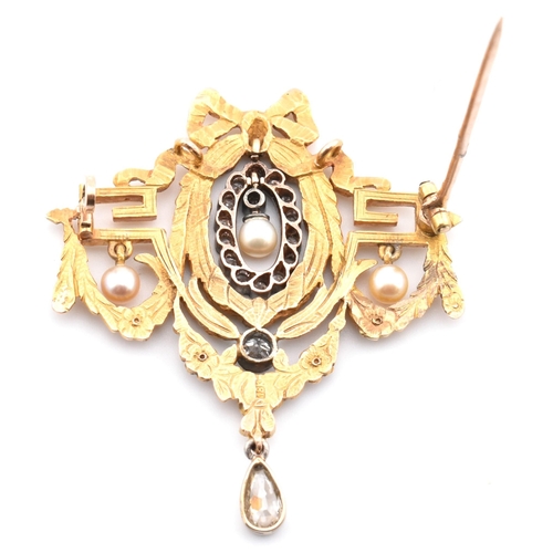 100 - An early 20th century Louis XVI style 18ct gold pearl and diamond brooch pin. The brooch pin in the ... 