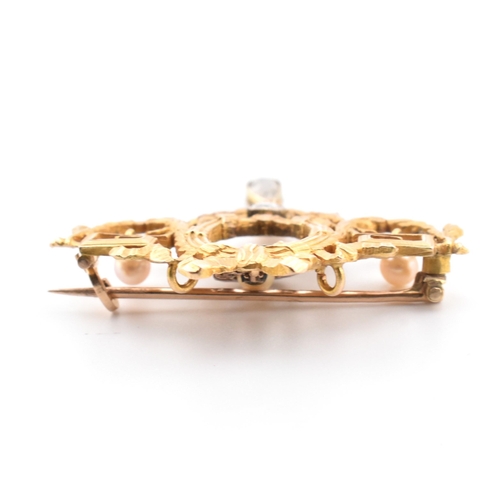 100 - An early 20th century Louis XVI style 18ct gold pearl and diamond brooch pin. The brooch pin in the ... 