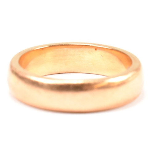 110 - A gold and paste band ring. The band ring having a star set round cut white paste stone. Unmarked ho... 