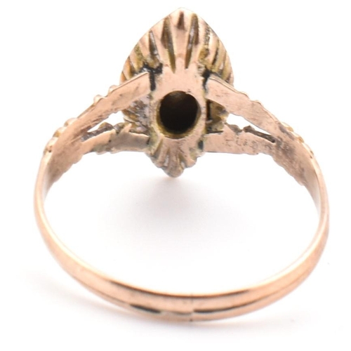 114 - An early 20th century 9ct gold and seed pearl navette ring. The Edwardian 9ct gold navette ring set ... 