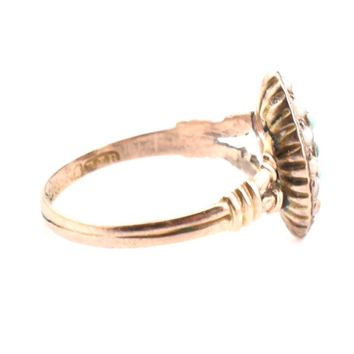 114 - An early 20th century 9ct gold and seed pearl navette ring. The Edwardian 9ct gold navette ring set ... 