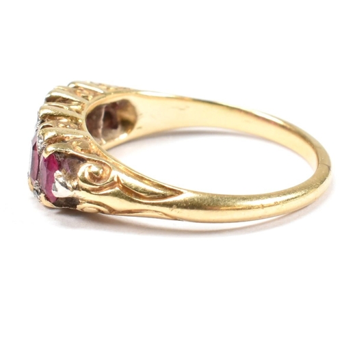 123 - A gold, red stone and diamond five stone ring. The ring having a mixture of mixed cut red stones inc... 