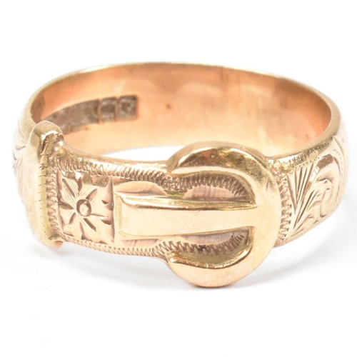 125 - A hallmarked 9ct gold buckle ring. The buckle ring having scrolling bright cut engraved decoration t... 