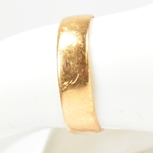 128 - A hallmarked 22ct gold band ring. The band ring hallmarked for Birmingham, 1906. Maker's mark H.A. W... 