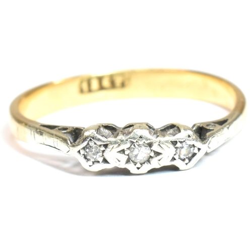 136 - An 18ct gold and diamond trilogy ring. The ring having three star set round cut diamonds to tapered ... 