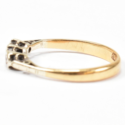 136 - An 18ct gold and diamond trilogy ring. The ring having three star set round cut diamonds to tapered ... 