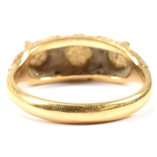 138 - A hallmarked 18ct gold, opal and diamond three stone ring. The 18ct yellow gold ring having with thr... 