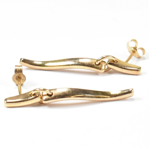 145 - A pair of hallmarked 9ct gold pendant earrings. The 9ct gold pendant earrings having straight posts ... 